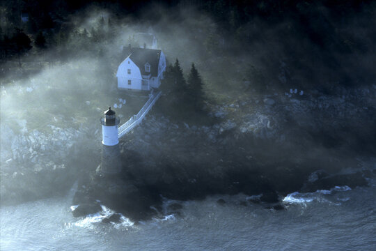 Aerial View Of A Lighthouse On Isle Au Haut, Maine.