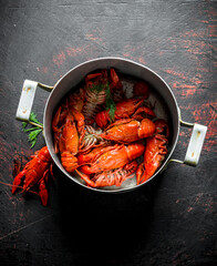 Boiled crayfish in a pan.