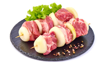 Raw pork skewers, ready to cook, BBQ, isolated on white background.