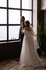 young couple bride and groom in a white dress