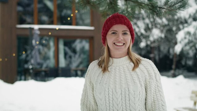 Close up of woman standing outdoors and enjoying the winter. Shot with RED helium camera in 8K.  