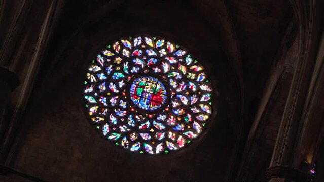 Round Colourful Stained Glass Window in the Dark Basilica de Santa del Mar, Barcelona (Circular Motion, 4K)