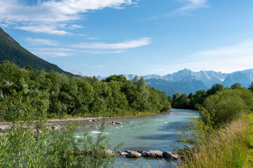 the Loisach river in Bavaria with a view to the Alps  