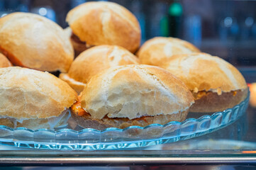 Snacks and appetizers. Spanish tapas on a black stone plate. Tapas bar.