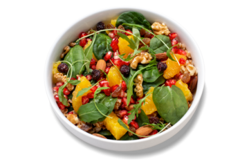 Isolated healthy salad with spelt, oranges, pomegranate seeds, nuts and greens, top view