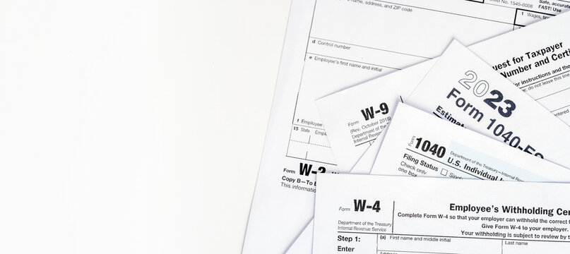 Tax return and filing concept forms 1040, W-2, w-4
