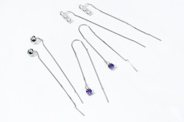 Elegant jewelry set. Jewellery set with gemstones. Jewelry accessories collage. Product still life concept. Ring, necklace and earrings.