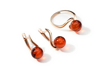 Elegant jewelry set. Jewellery set with gemstones. Jewelry accessories collage. Product still life concept. Ring, necklace and earrings.