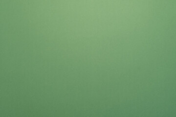 Panorama de fond uni en papier vert pour création d'arrière plan.	