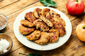 Homemade cutlets from oatmeal and apples.