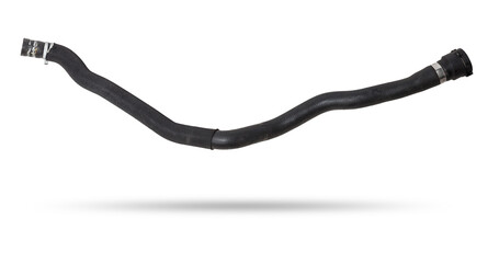 Black plastic hose of the car engine cooling system on a white isolated background in a photo...