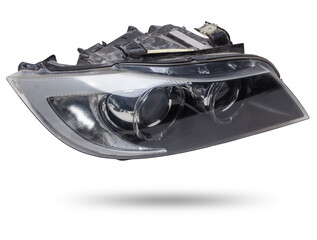 Stylish xenon right headlight of a German car - optical equipment with a lamp inside on a white isolated background. Spare part for auto repair in a car workshop. © Aleksandr Kondratov