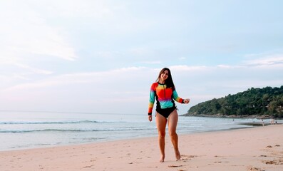 Woman standing on the Nai Thon beach in Phuket 