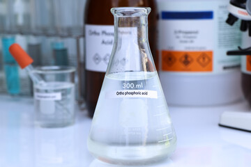 ortho phosphoric acid in bottle , chemical in the laboratory and industry