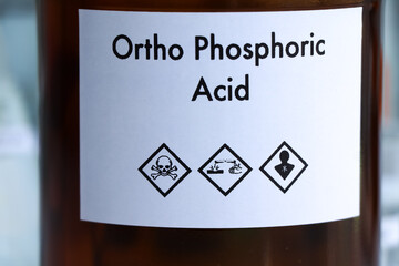 ortho phosphoric acid in bottle , chemical in the laboratory and industry
