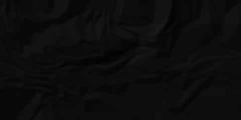 Dark Black facbric paper backdrop crumpled texture. dark black textured crumpled black paper background. panorama black paper texture background, crumpled pattern.