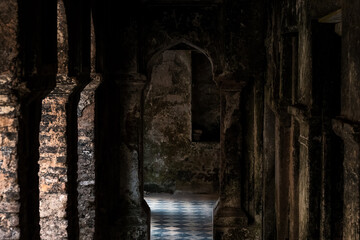 Creepy abandoned building interior with ruined old walls