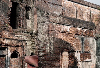 Fully damaged brick structural old abandoned building