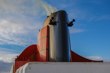 Close up detail view of legendary red black funnel of transatlantic ocean liner cruiseship cruise...