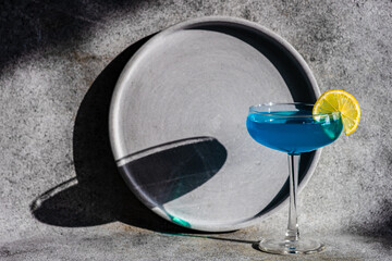 Glass of blue kamikaze drink