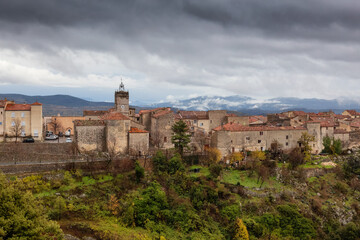 Fototapeta premium Homes in a small touristic town, Mons, France. Cloudy Fall Season Sky.