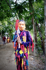 Fototapeta premium Hindu religious village people celebrating gajan festival wearing colourful costumes