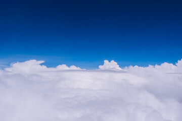 View scene of the white fluffy clouds and blue bright sky background