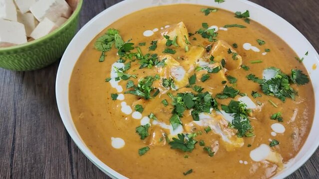 Paneer butter masala made with home made paneer , butter , cashews and other masalas.  Famous Indian recipes.