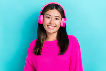 Portrait of positive pretty lady wear trendy pink clothes enjoy quality sound modern device isolated on cyan color background