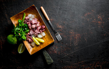 Baby octopus with lime and greens.