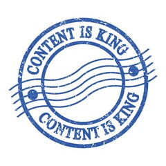 CONTENT IS KING, text written on blue postal stamp.