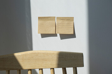 hand draw checklist on note taped recycle paper