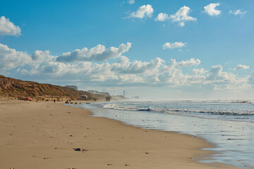 Coast. Seascape with sky reflection in the water