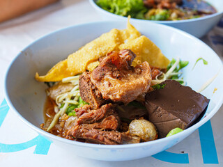 Stewed Pork Noodles Longan juice soup closeup view
