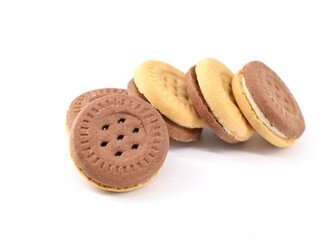 Bicolor round cookies filled with vanilla on white background.
