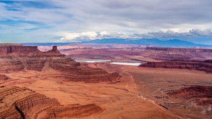 Dead Horse Point State Park near Canyonlands National Park with the Potash Evaporation Ponds in the background