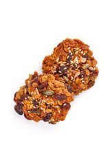 Homemade oat cookies with seeds, isolated on white background.