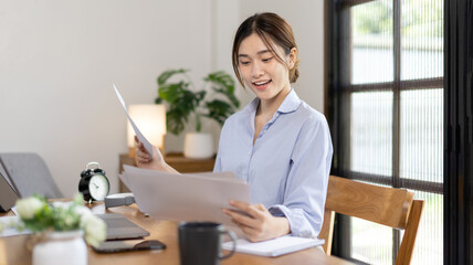 Work from home, College student is analyzing data or doing homework assignments in her house, Use your laptop to search for information and educate yourself at home, Stay home, Internet learning.