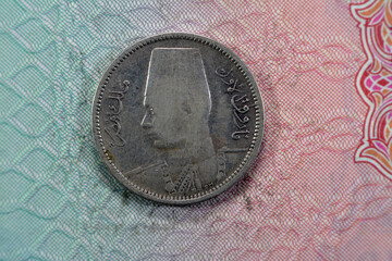 Ancient round old two 2 piasters coin at the era of king Farouk I features value and kingdom of...