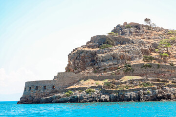 Fototapeta na wymiar Spinalonga island (Kalidon), former leper colony and fortress at Plaka,
