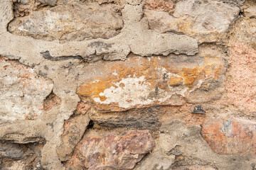 Grunge wall background with old stones texture