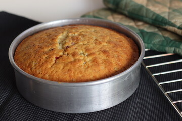 Tutti fruity butter milk cake inside the baking tin