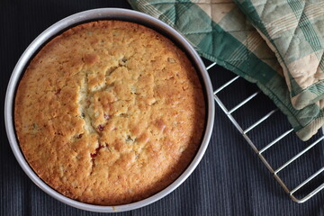 Tutti fruity butter milk cake inside the baking tin