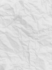 Abstract wrinkled or Free photo crumpled white paperboard or empty canvas or paper surface with folded stains.