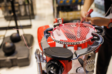 weaving badminton racket, Stringing badminton racket on racquet weaving machine. repair badminton...