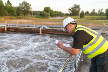 Environmental engineers work at wastewater treatment plants,Water supply engineering working at Water recycling plant for reuse