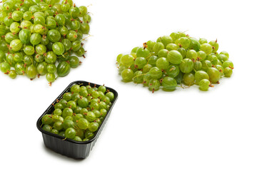 A group of gooseberries isolated on a white background.