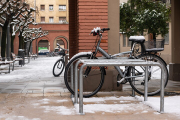 Parked bike with snow