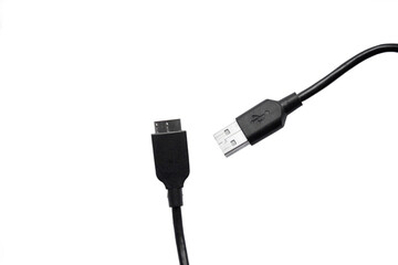 USB cord on a white background, connection and contact of wires for a computer, laptop and other electronics.