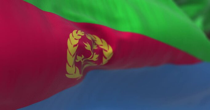 Close-up view of the Eritrea national flag waving in the wind.